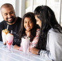 Family enjoying a variety of the freakshakes offered at Waffling Whale Cafe